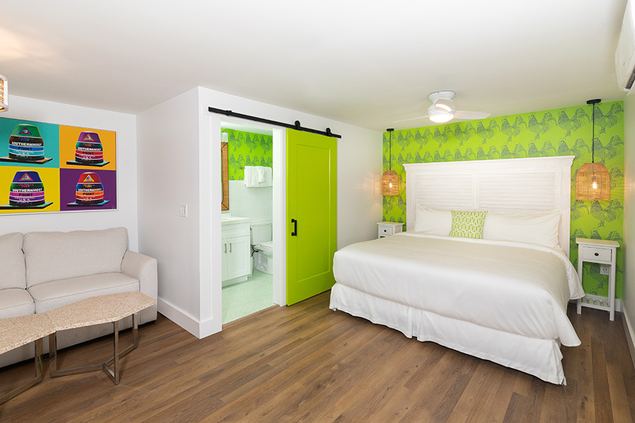 Image of hotel room with green accents
