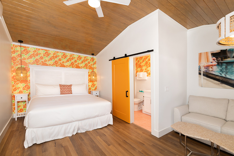 Image of hotel room with orange accents