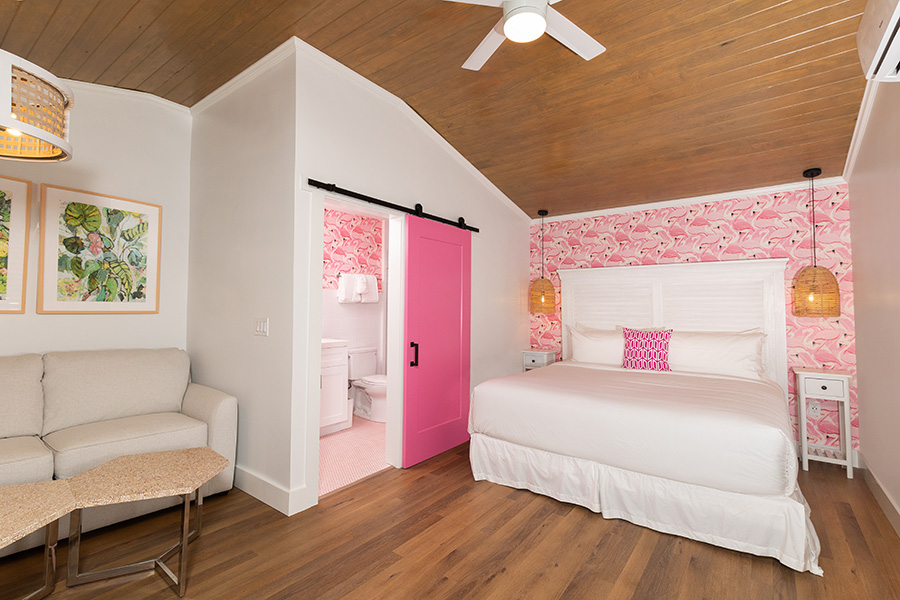 Image of hotel room with pink accents